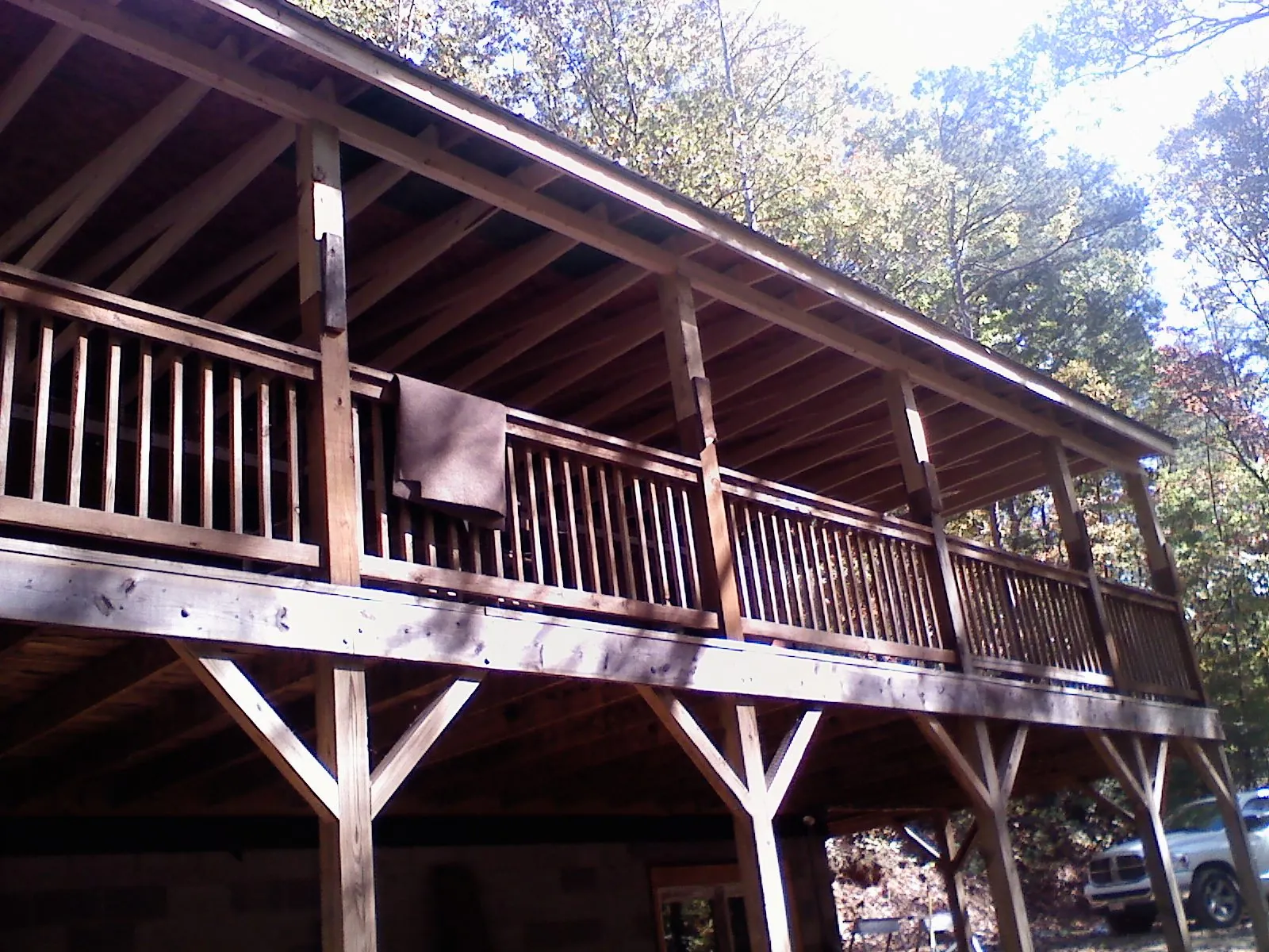 Timber framing under a new elevated porch and deck — Roof Leak Repair in Minocqua by Roofing Brothers